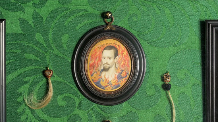 A painting called A Man Consumed by Flames by Isaac Oliver on the wall of the Green Closet at Ham House and Garden, London